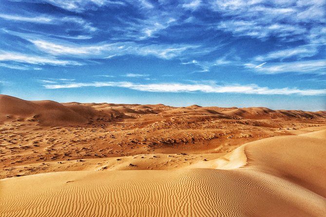 Desert Experience: Wahiba Sands & Wadi Bani Khalid Full-Day Tour - Wadi Bani Khalid: Oasis Water, Swimming Rules, and Cave Chances