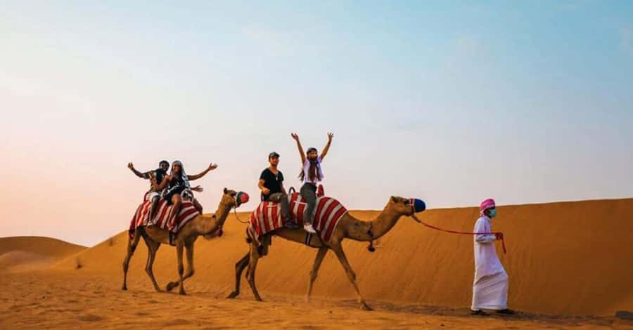 Desert Safari - Private 4WD car - Desert camp dinner: camel ride, henna, sweets, and the BBQ buffet