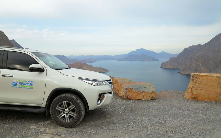 From Dubai: Musandam Khasab Tour with Boat Trip and Safari - Morning pickup and the road to Khasab harbor