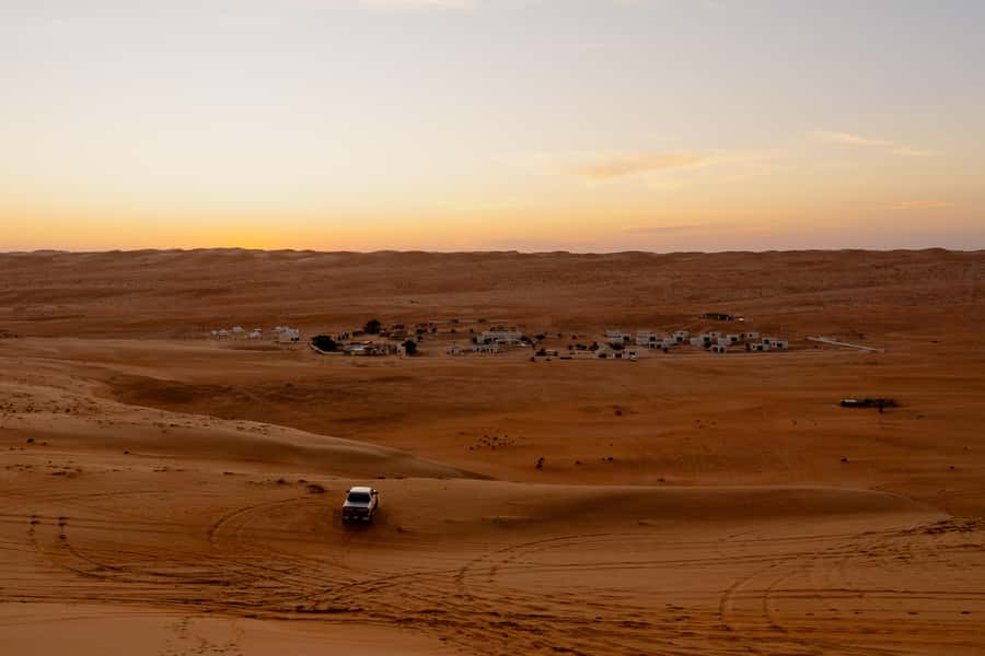 From Muscat: Guided Overnight Desert Camp Tour - Day 1: Wadi Shab canyon hike, swimming, and the Sur area detour