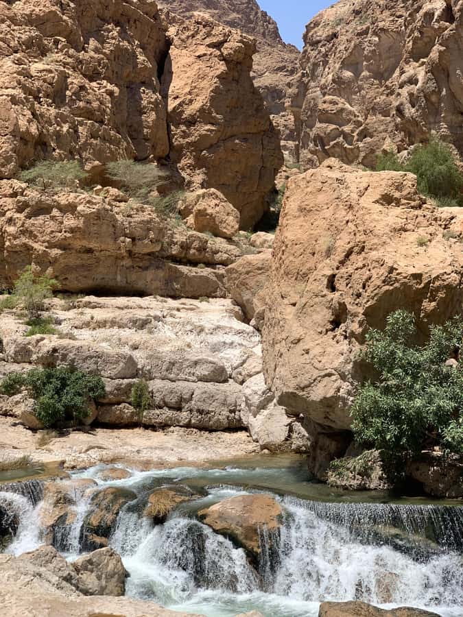From Muscat: Wadi Shab & Sinkhole Private Tour & Free Lunch - Bimmah Sinkhole: meteor-crater lake, photos, and a second swim