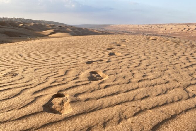 Full-Day Private Tour of Wahiba Sands Desert and Wadi Bani Khalid - Wadi Bani Khalid: Emerald Pools, Swimming Time, and Mountain Views