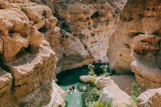 Full Day Wadi Shab And Bimah Sinkhole with Pick Up Included - Fins Beach on the Amerat-Sur Highway: White Sand and a Sea Breeze