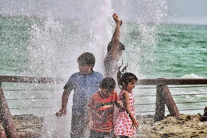 Full day west tour of Salalah - Al-Fezayeh Beach: Silver Sand, Clear Water, and Real Break Time