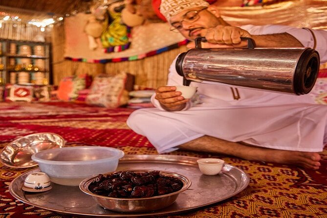 Jabal Shams Food Tour - Al Hamra home lunch: rose water, chicken on rocks, and floor dining