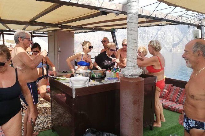 Khasab Dhow Cruise Full day, Buffet Lunch on Board, swimming - Step Aboard: What the Traditional Dhow Feels Like In Real Life