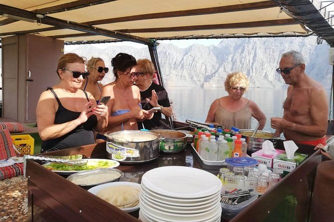 Khasab Dhow Cruise Full day, Buffet Lunch on Board, swimming - Lunch and Unlimited Drinks: The Onboard Fuel That Actually Helps