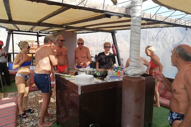 Khasab Dhow Cruise Full day, Buffet Lunch on Board, swimming - Getting on and off Without Stress: Pickup and Timing Reality