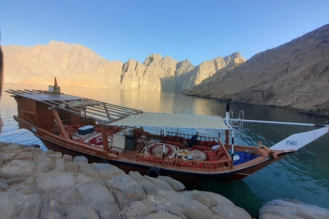 Khasab Dhow Cruise To Musandam Fjords With Lunch Onboard - Dolphins and the crew’s job: how you maximize the odds