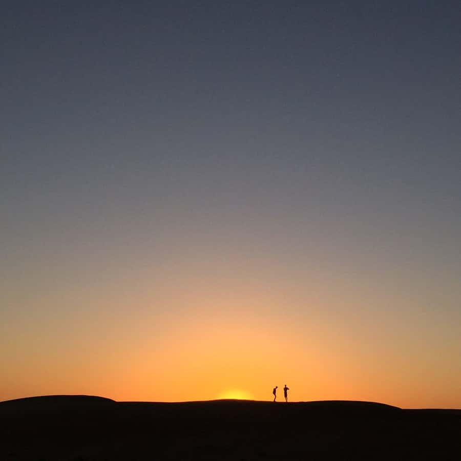Muscat: Bidiya Desert Sunset Camel Ride with Transfer - Sunset time in clear desert air: how to make the photos and the moment work