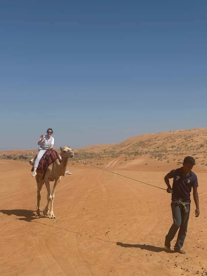 Muscat: Bidiya Desert Sunset Camel Ride with Transfer - Guide quality is part of the product here
