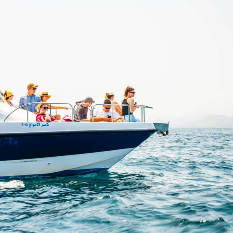 Muscat: Dolphin Watching and Snorkeling Trip - On Board Comfort: Snacks, Water, and Staying Practical