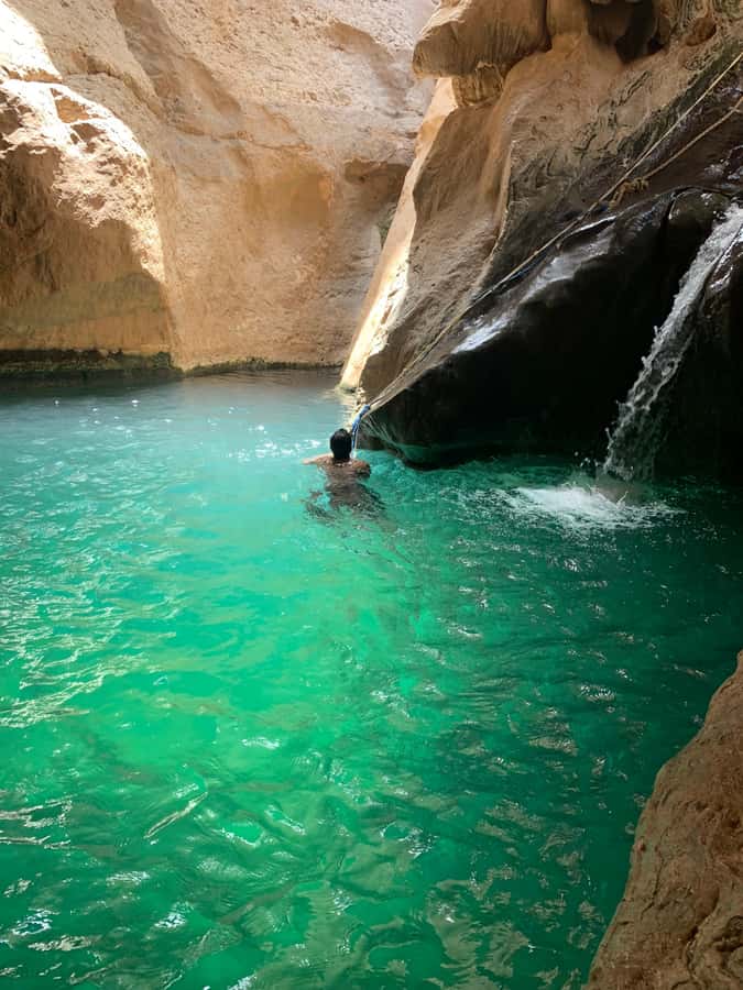 A waterfall pool in the upper gorge at Wadi Shab