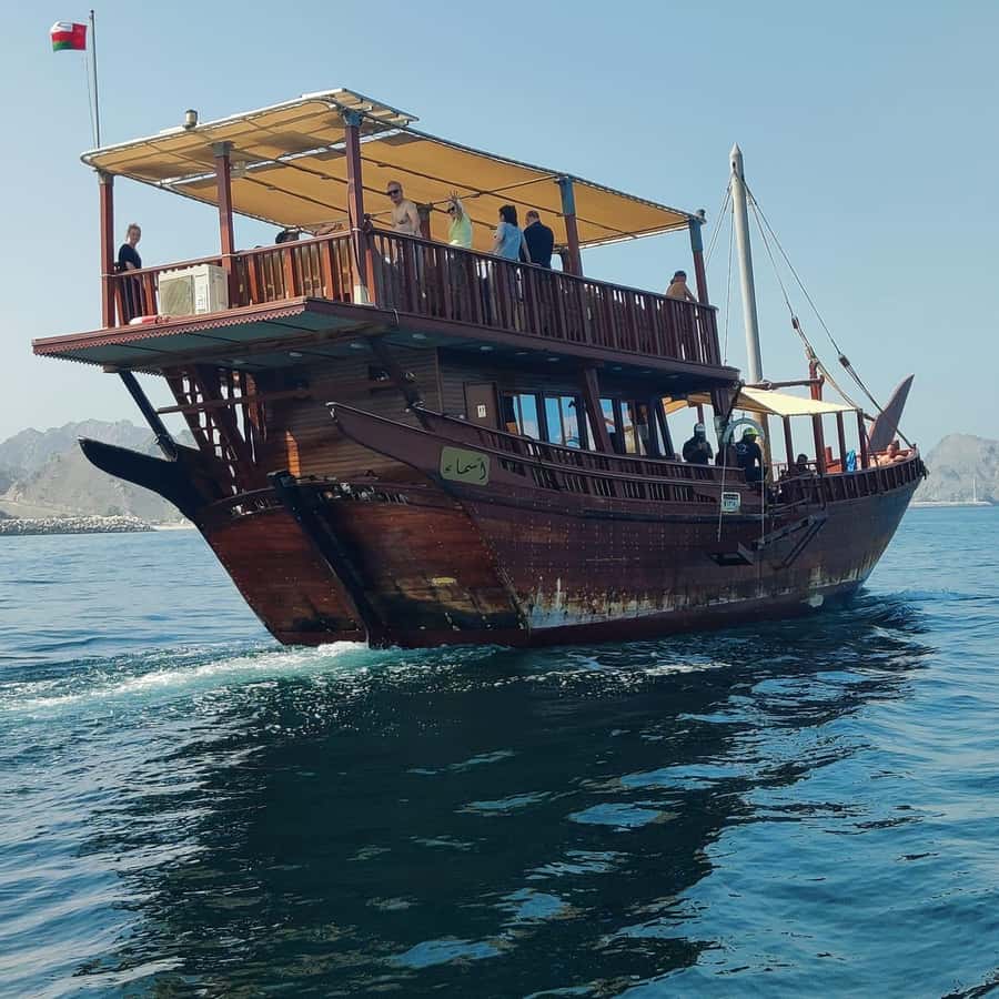 Muscat: Omani Dhow Coastal and Sunset Cruise - On the water: traditional dhow cruising and the view that keeps moving