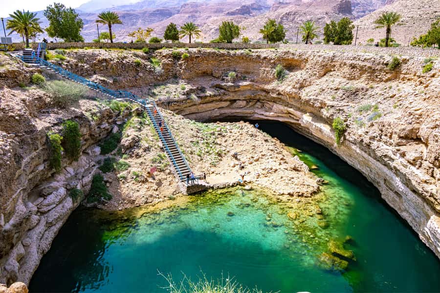 Muscat: Southern Treasures & Wadi Shab Tour with Audio Guide - Wadi Shab walk to the pools and cave, the part that sets the tone
