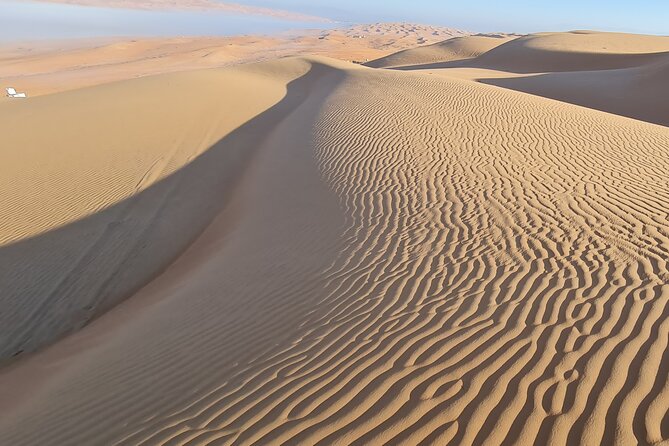 Oman Highlights: Wahiba Sands Desert & Wadi Bani Khalid Tour - Camel ride costs and how to handle them smoothly
