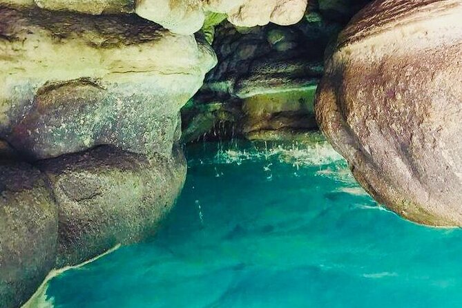 Private Full-Day Wadi Shab and Bimmah Sinkhole Tour - Swimming in crystal-clear water and the keyhole passage