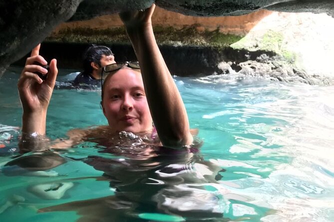 Private Full-Day Wadi Shab and Bimmah Sinkhole Tour - Fins Beach (Tiwi): white pebbles and that unreal blue water