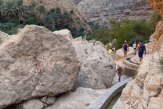 Private Full- Day Wadi Shab-Bimmah Sinkhole-Fins Beach Tour - Tiwi and Fins Beach: white pebbles, blue water, and a proper reset