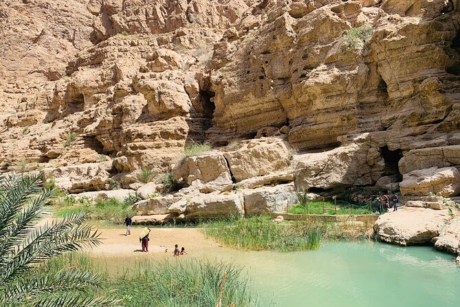 Private Oman Desert Overnight in Wahiba Sand and Wadi Exploration - Bimmah Sinkhole: a turquoise crater before heading to Muscat