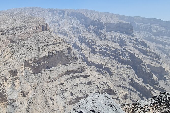 Private Overnight Nizwa & Jebel Akhdar Tour from Muscat - Day 1: Nizwa Fort museum, Nizwa Souq, and the Al Kattmyn falaj