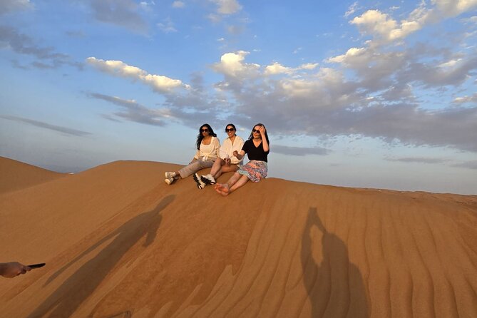 Private Watching Sunset Desert Safari Tour - Sunset on the dune top: timing, photos, and how to enjoy it