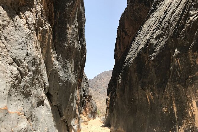 Tour Shahad 4 Days-3 Nights, Oman Tours Package - Day 4: Wadi Shab pools and cave swim moment, then Fins Beach and Bimmah Sinkhole