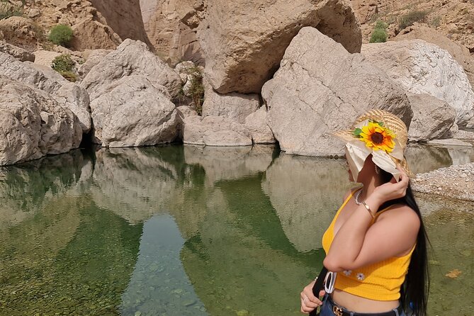 Wadi Al Arbeieen Sinkhole & Fins Beach Swim & Hike - Stop 2: Passing Bimmah Sinkhole for Photos and a Quick Water Moment