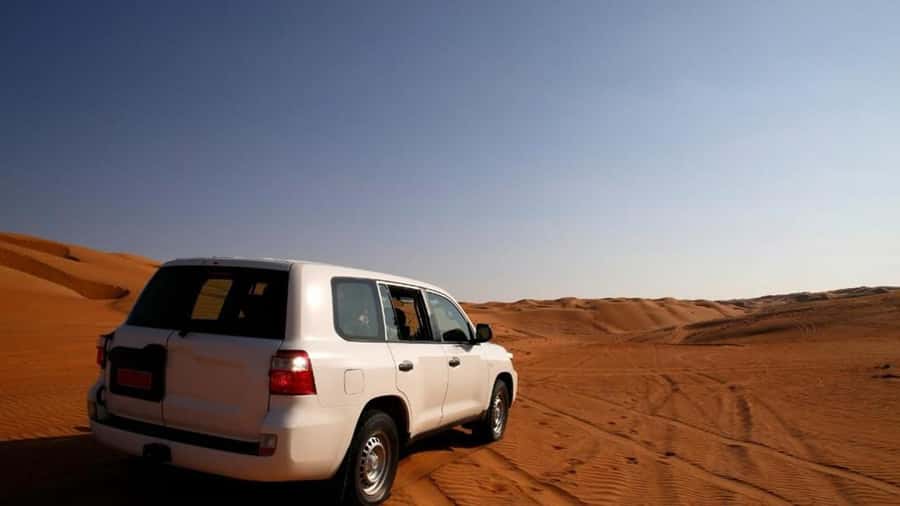 Wahiba Sand and Wadi Bani Khalid Guided Group Tour - Wahiba Sands: 4WD Dunes, Bedouin Encounters, and Sandboarding