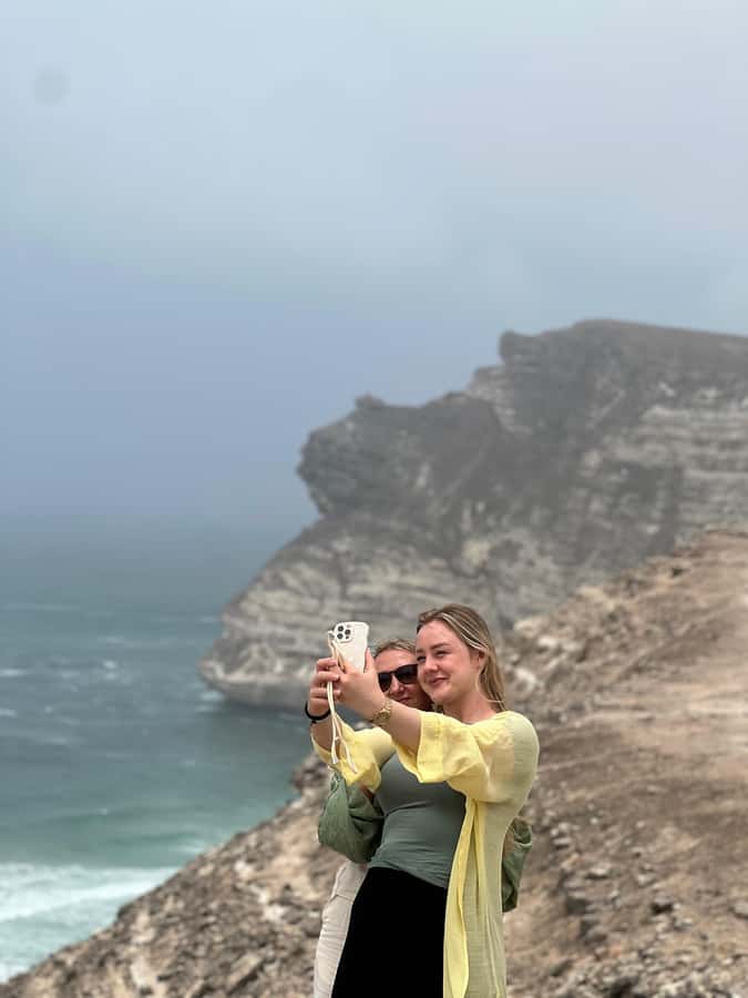 West Salalah: Caribbean of the Orient Fazayah Beaches & City - Masood Hidden Beach photo stop: cliffs, quiet, and a quick pause