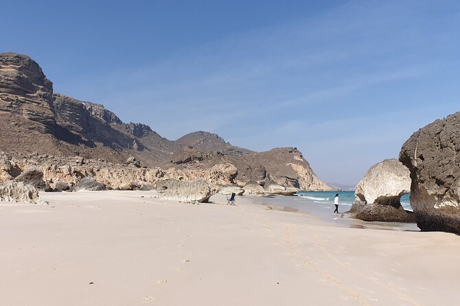 West Salalah Tour - Caribbean of Orient - Fazayah Beach with City - Al Mughsail Beach: white sand, photo time, and a realistic swimming expectation